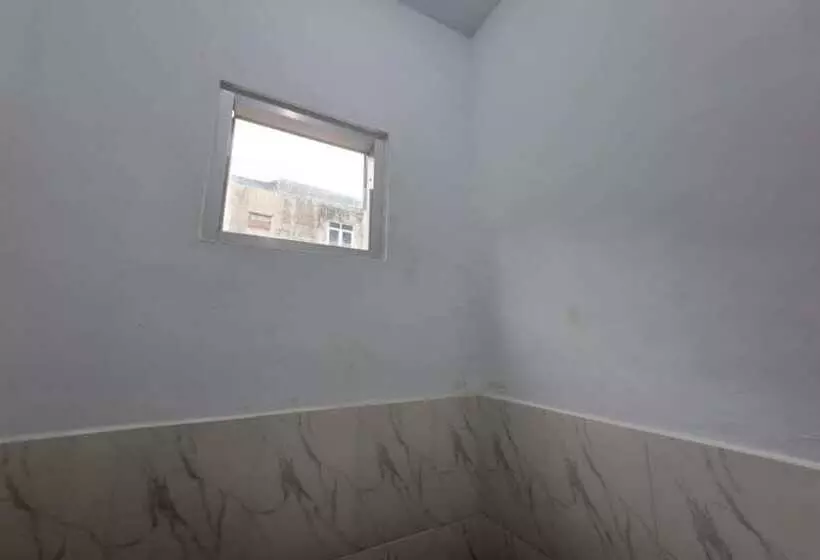 Hotelli Spot On 93464 Penginapan Tulimario Syariah