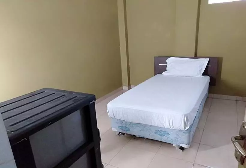 Hotelli Spot On 93464 Penginapan Tulimario Syariah