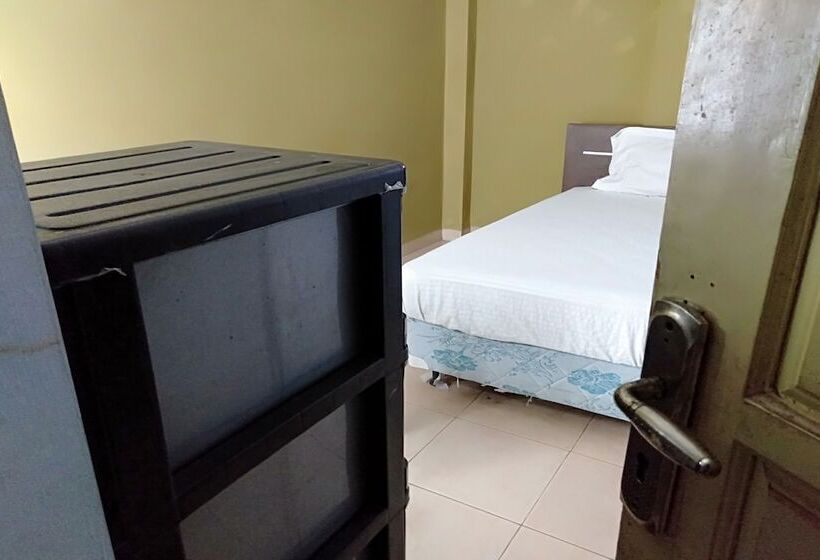 Otel Spot On 93464 Penginapan Tulimario Syariah