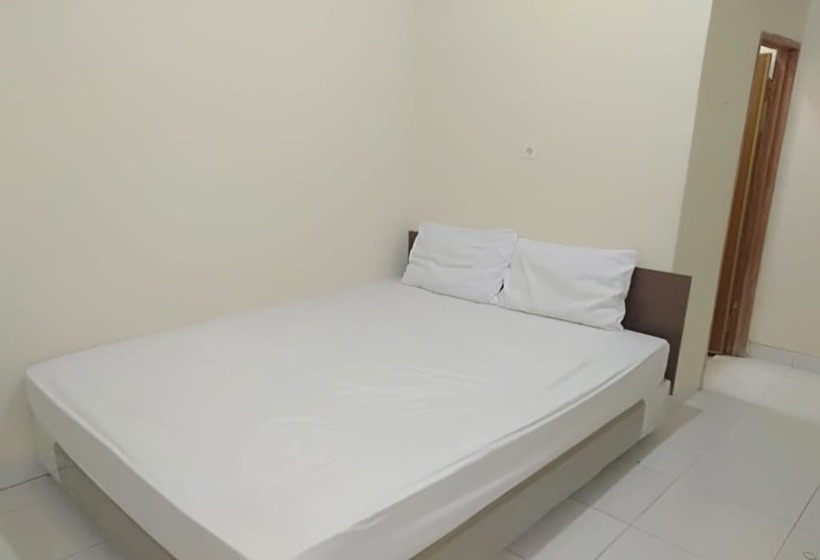 Otel Spot On 93464 Penginapan Tulimario Syariah