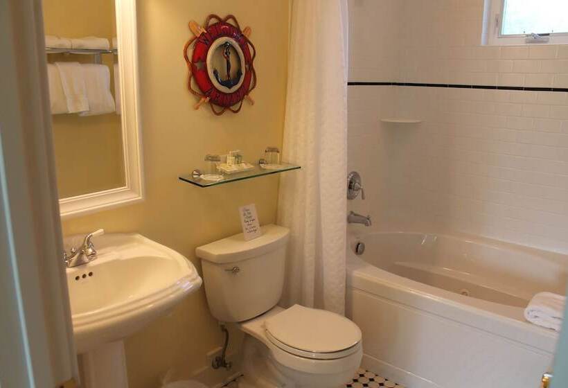 בית מלון כפרי Captain's Cottage Suites