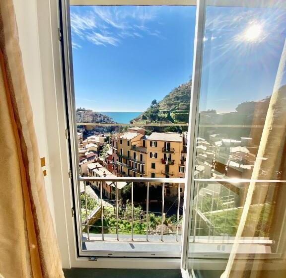 ペンション The Manarola Main Plaza