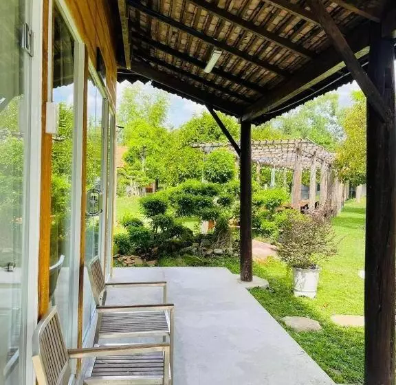 هتل Garden House Tí Nị