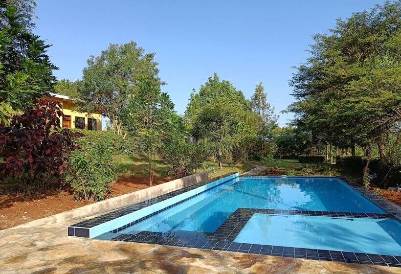 호텔 Tanzanice Farm Lodge