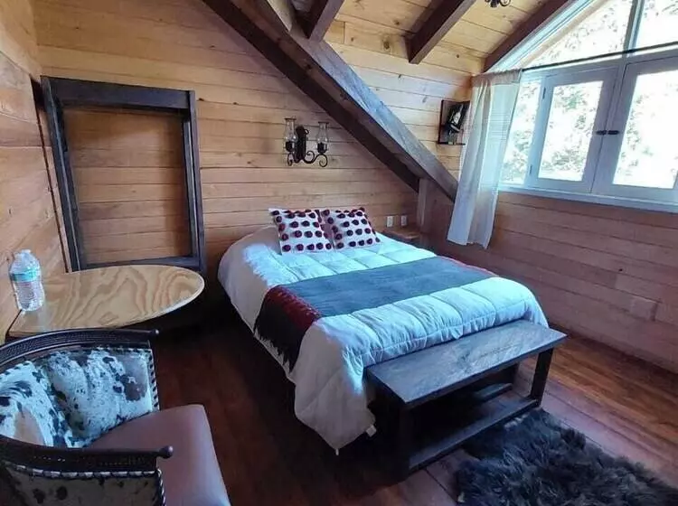 Hotelli La Cabaña Del Bosque