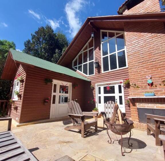 호텔 La Cabaña Del Bosque