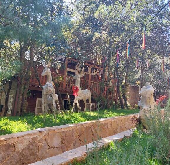 호텔 La Cabaña Del Bosque