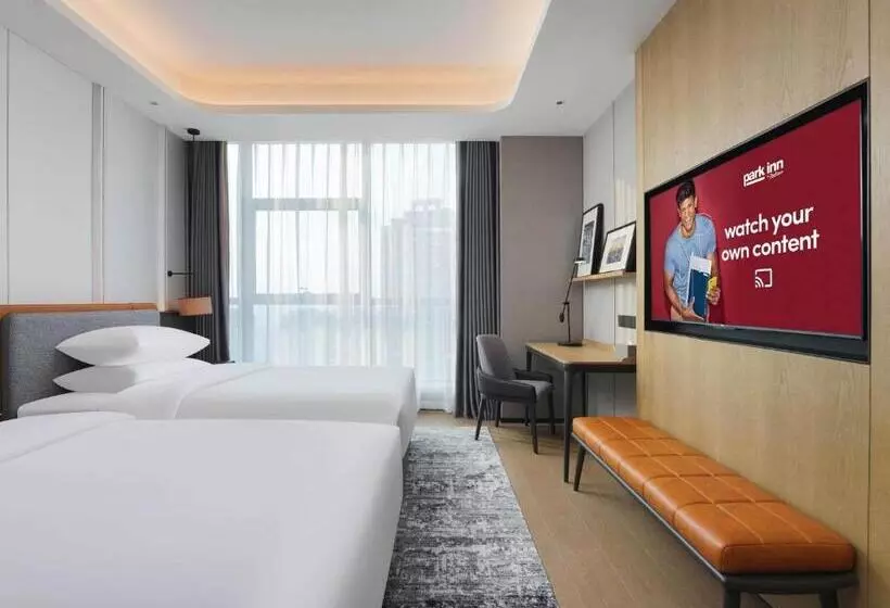 Hotelli Park Inn By Radisson Nanchong Yilong Star City Plaza