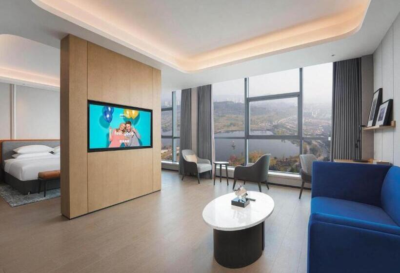 בית מלון כפרי Park Inn By Radisson Nanchong Yilong Star City Plaza