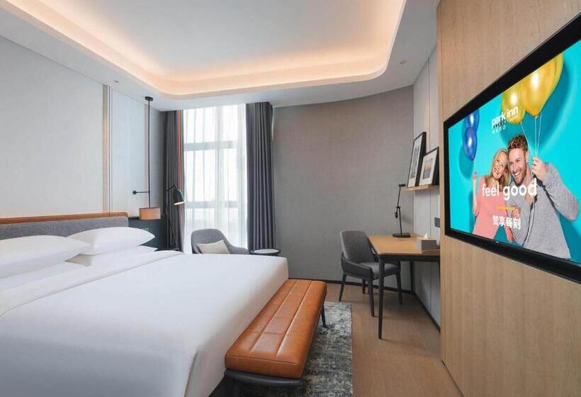 בית מלון כפרי Park Inn By Radisson Nanchong Yilong Star City Plaza