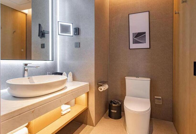 בית מלון כפרי Park Inn By Radisson Nanchong Yilong Star City Plaza