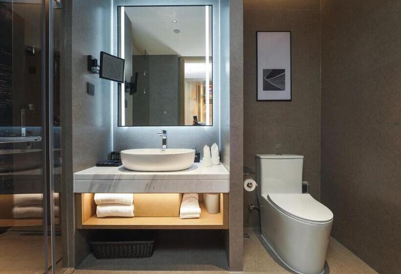 בית מלון כפרי Park Inn By Radisson Nanchong Yilong Star City Plaza