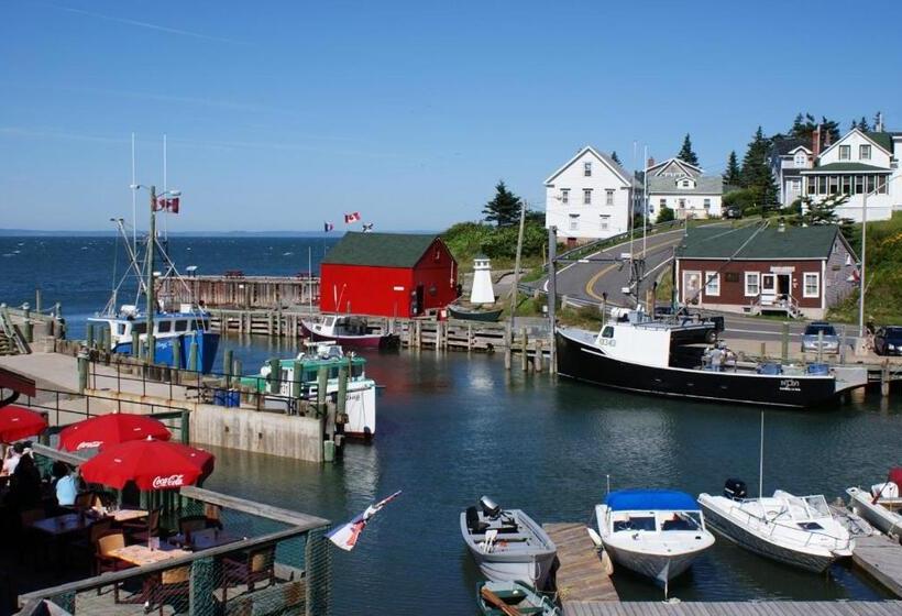 ペンション Tides Inn Guest Suites