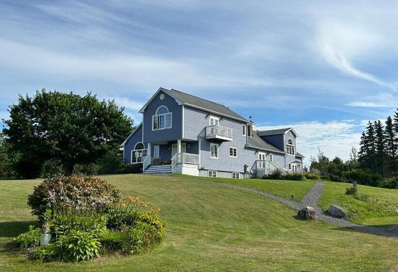 ペンション Tides Inn Guest Suites