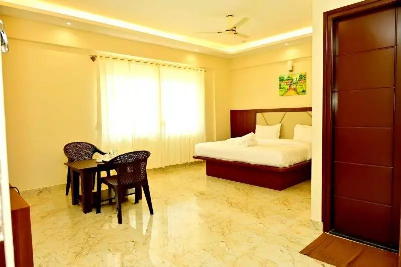 ホテル Downtown Pr Groups Raashi Residency