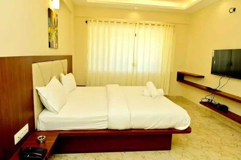 ホテル Downtown Pr Groups Raashi Residency