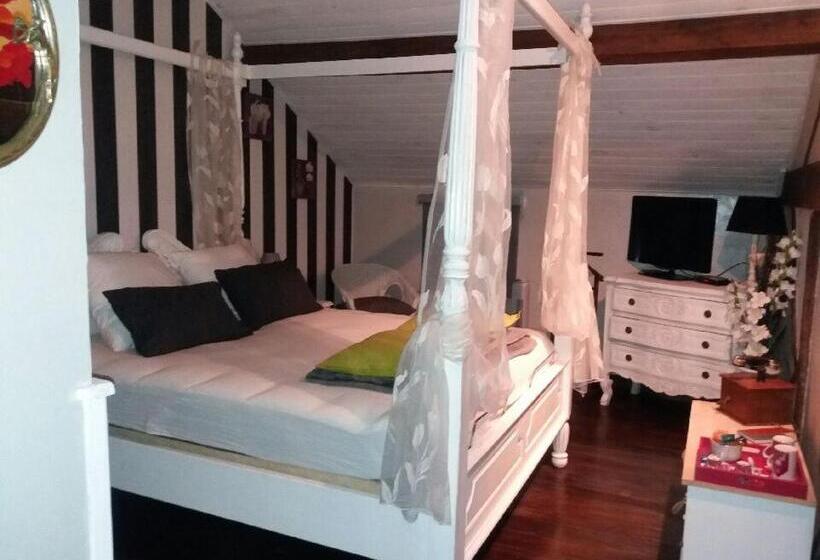 مبيت وإفطار Chez Les Dom’s