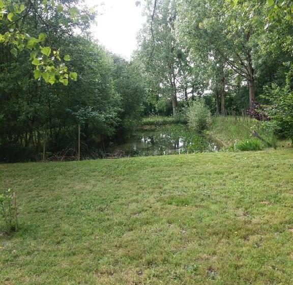 مبيت وإفطار Chez Les Dom’s