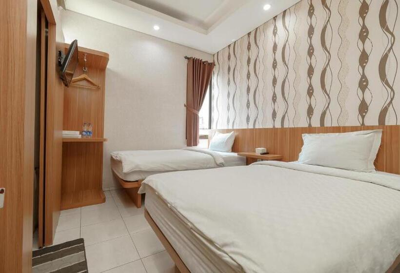 בית מלון כפרי Green Apple Residence Near Sarinah Mitra Reddoorz