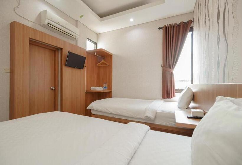 בית מלון כפרי Green Apple Residence Near Sarinah Mitra Reddoorz