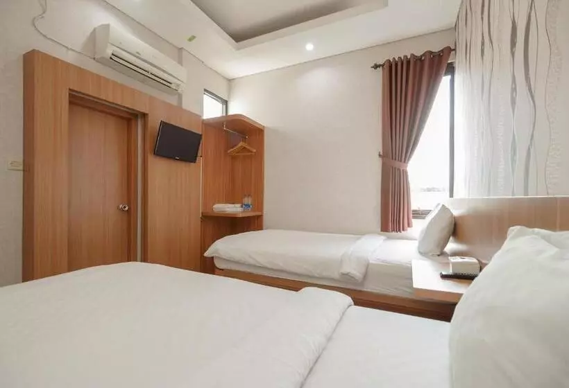 ホテル Green Apple Residence Near Sarinah Mitra Reddoorz