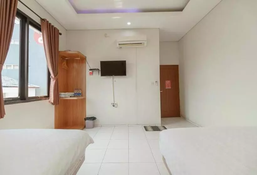 ホテル Green Apple Residence Near Sarinah Mitra Reddoorz