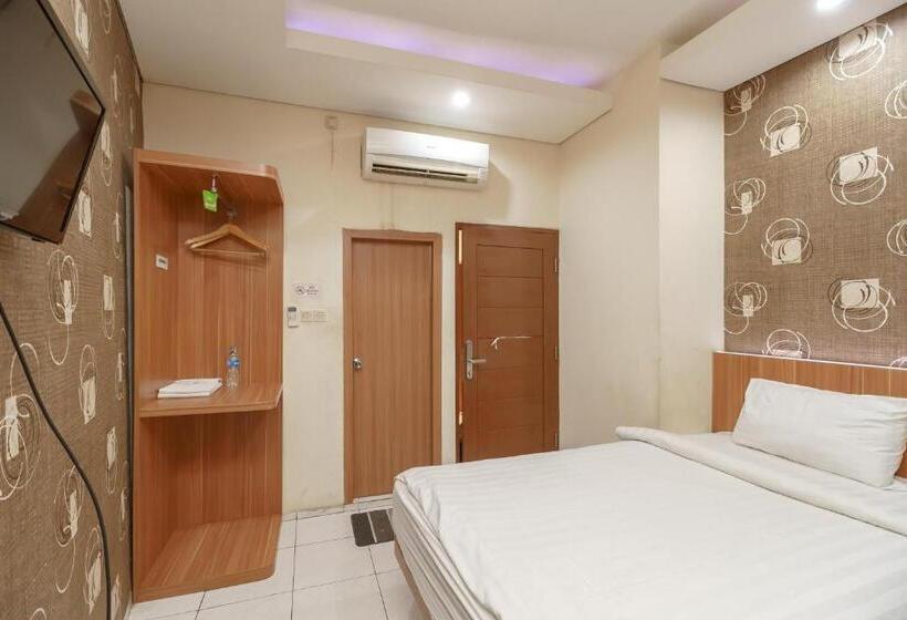 בית מלון כפרי Green Apple Residence Near Sarinah Mitra Reddoorz