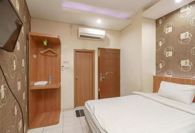 ホテル Green Apple Residence Near Sarinah Mitra Reddoorz