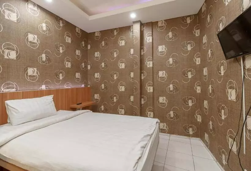ホテル Green Apple Residence Near Sarinah Mitra Reddoorz