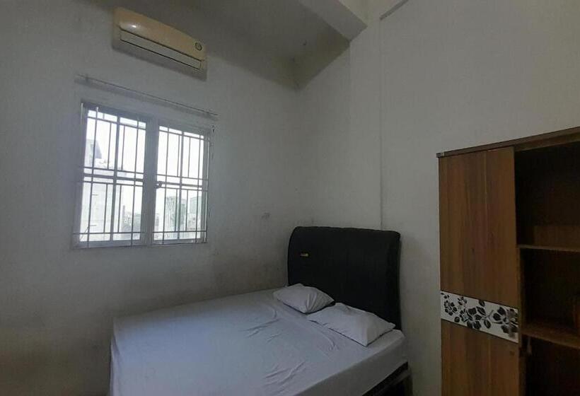 Hotel Spot On 93782 Hasibuan Homestay Syariah