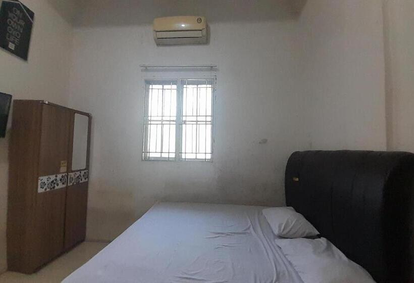 Hotel Spot On 93782 Hasibuan Homestay Syariah