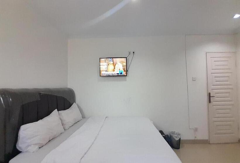 Hotel Spot On 93782 Hasibuan Homestay Syariah