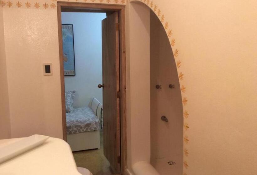 تختخواب و صبحانه Caraibidamari