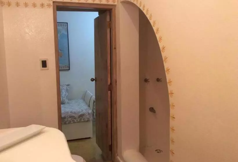 تختخواب و صبحانه Caraibidamari