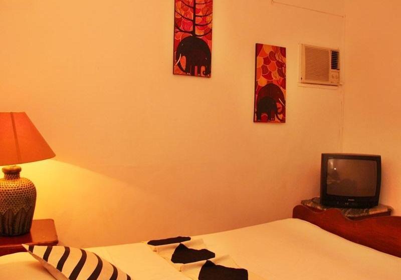 בית מלון כפרי Capital O 236 Amaa River Garden