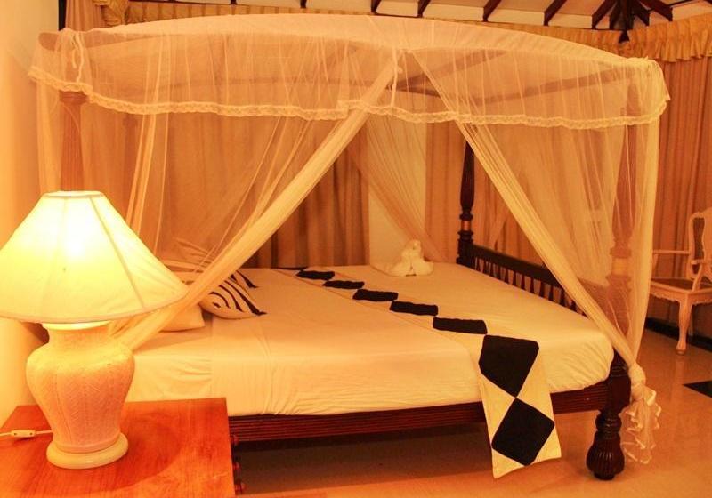 בית מלון כפרי Capital O 236 Amaa River Garden