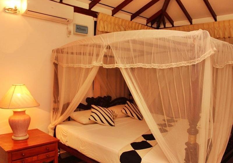 בית מלון כפרי Capital O 236 Amaa River Garden