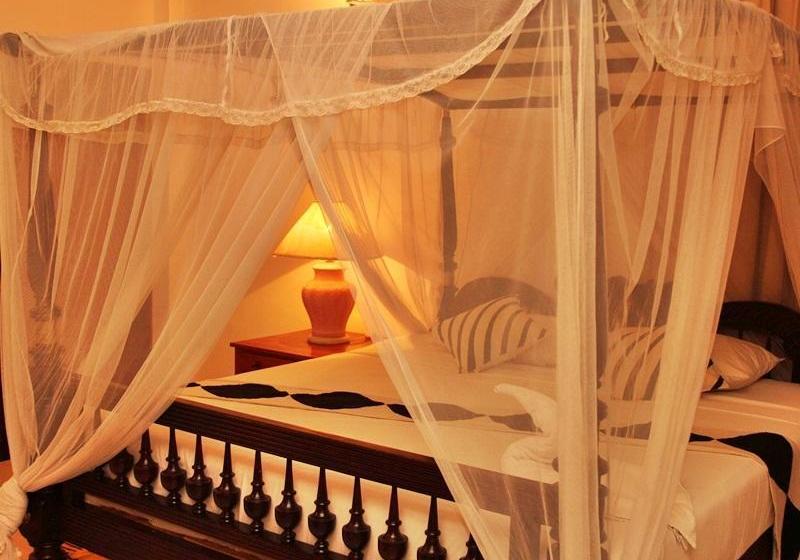 בית מלון כפרי Capital O 236 Amaa River Garden