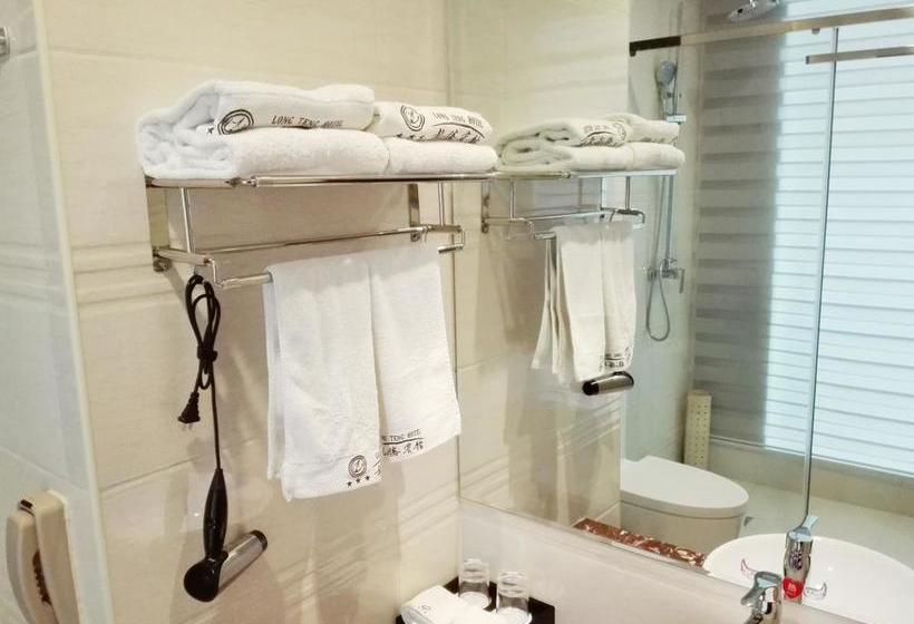 Отель Jiuquan Longteng