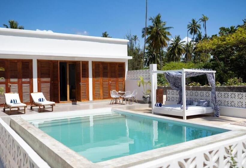 בית מלון כפרי Pili Pili Orient Beach Resort