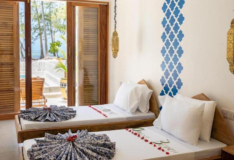 בית מלון כפרי Pili Pili Orient Beach Resort