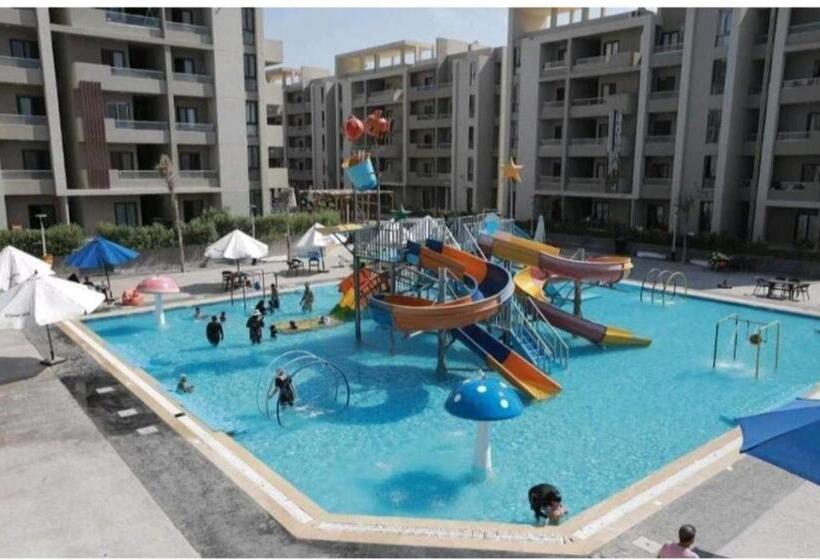 استراحتگاه شالية مكيف للعائلات بقرية جراند هيلز الساحل الشمالي الاتصال قبل الحجز