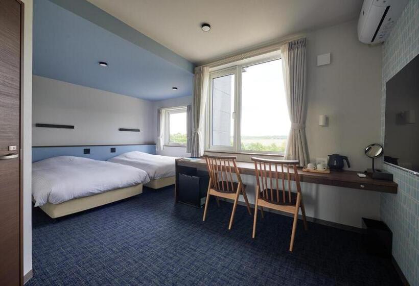 בית מלון כפרי Rising Sun Furano