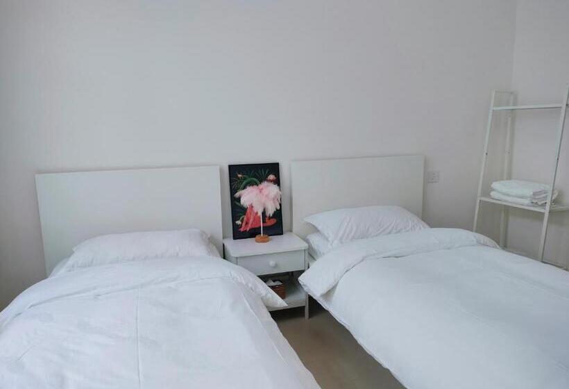 تختخواب و صبحانه Lotus Art Inn Pek Airport 菡庭筱院民宿北京首都机场店