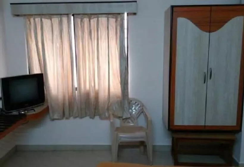 ホテル Iroomz Amrutha Residency