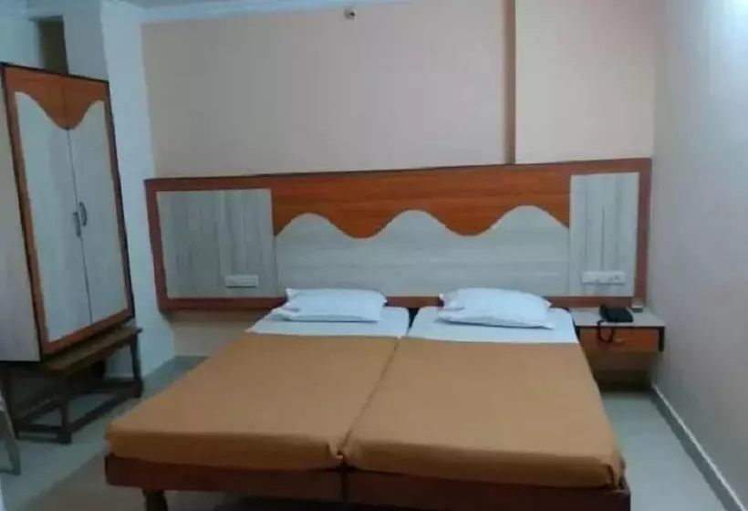 ホテル Iroomz Amrutha Residency