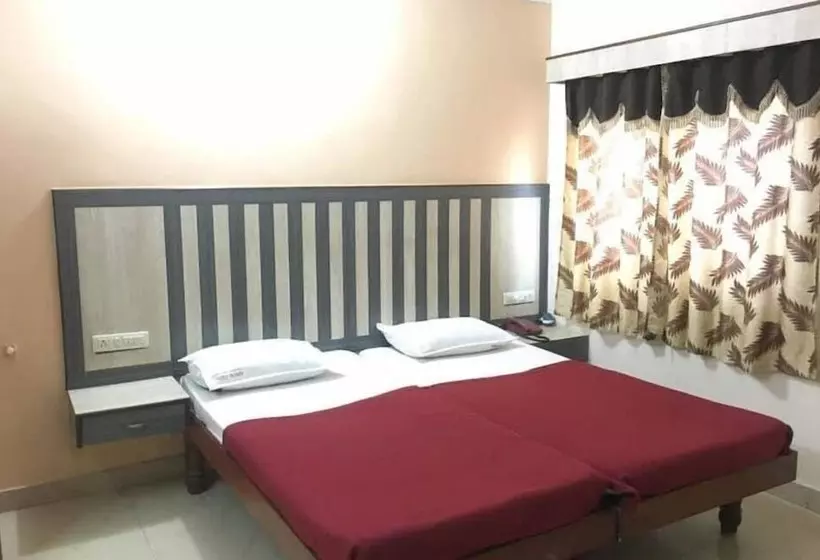 ホテル Iroomz Amrutha Residency