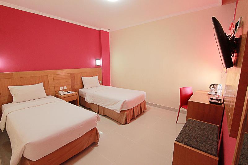 Отель Maleosan Inn Manado