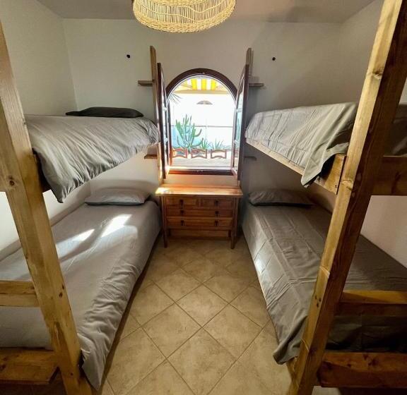 هاستل Pura Vida Surf Camp & School