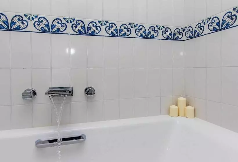 تختخواب و صبحانه Diecisedici